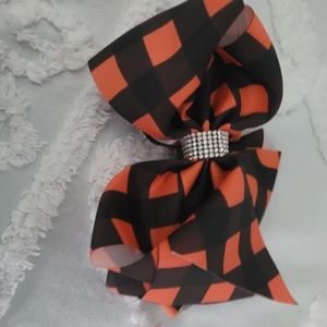 Girls large orange and black bow